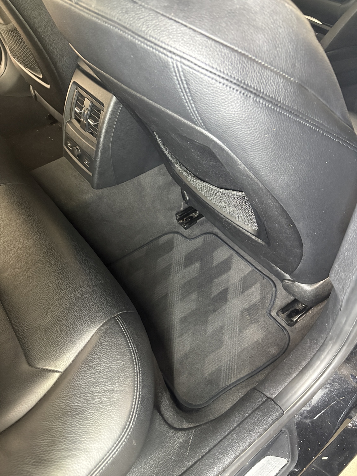 Detailed BMW rear carpet and seating